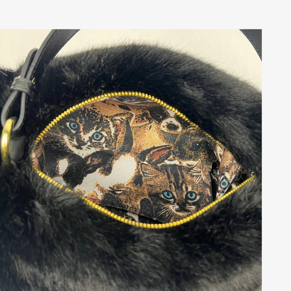 Een realistische kattenhandtas die overal indruk maakt 