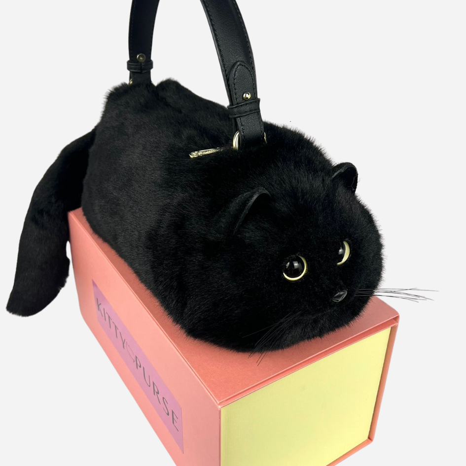 Een realistische kattenhandtas die overal indruk maakt 